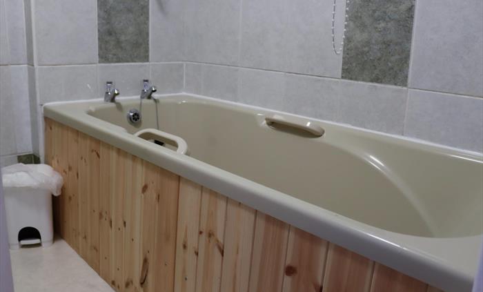 (I know the bath isn't white)   Electric Shower over Bath. Comfort height Toilet. Emergency Toiletries in case you have forgotten to bring them. All t